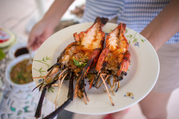 Grilled shrimps with seafood spicy sauce.