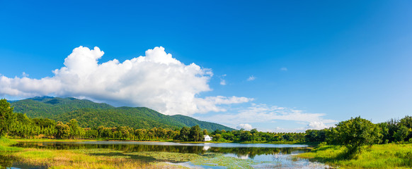  house near the lake and the mountain .