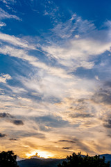  blue sky and mountain in background.