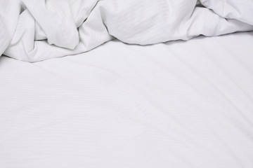 White delicate soft background of fabric or bedding sheet