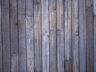 Close up top view abstract dark brown color of wood texture table vintage background.