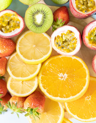 Fototapeta na wymiar Healthy eating with Fresh fruits and Assorted fruits colorful background