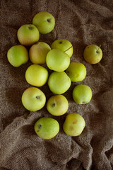 Ripe apples on burlap