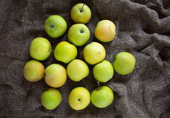 Ripe apples on burlap