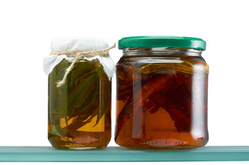 Glass jars with various tinctures in isolate