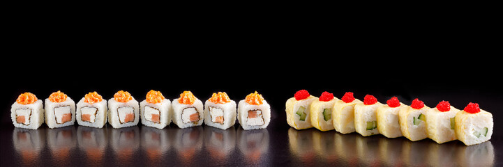 Classic sushi roll. Sushi at black background.Japanese seafood sushi , sushi a black background.