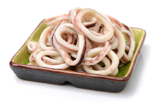 fresh raw squid rings on white background