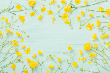 summer flowers on green wooden background