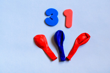 31 celebrating red blue number with cute colorful balloons. Thirty one Modern alphabet digits on...