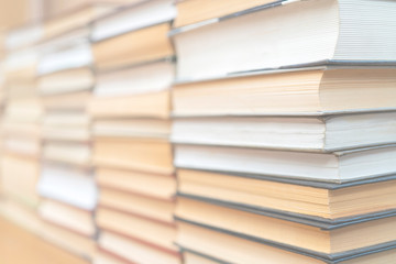Rows of books in the library. Background for text. Symbol of knowledge and learning.