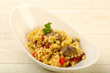 Bulgur with chicken hearts