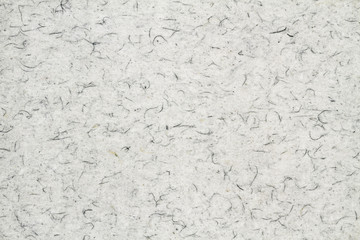 Light grey or white villus or fiber paper. Closeup