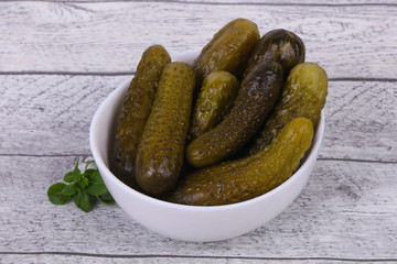 Pickled cucumbers heap in the bowl