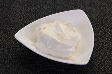 Sour cream in the bowl
