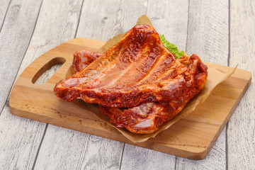 Raw marinated pork ribs