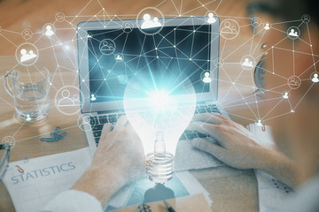 Growing arrows with businessman working on computer on background. Success concept. Double exposure.