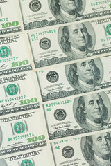 Background of one hundred dollar bills. Benjamin Franklin on USA money banknote