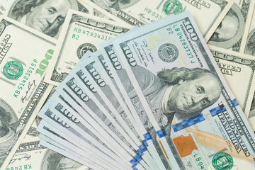 Background of one hundred dollar bills. Benjamin Franklin on USA money banknote	