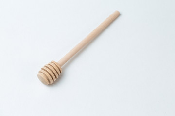 Wooden sticks for honey on a white background	