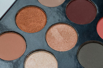 Colorful eye shadows palette. Colorful make-up palette background.	