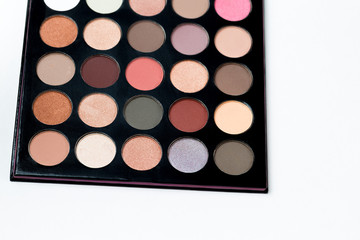 Colorful eye shadows palette. Colorful make-up palette background.	