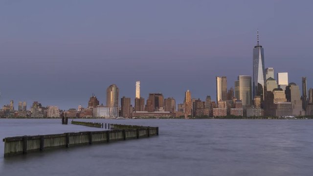Time lapse of full moon rise over Financial District from Hudson river