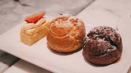 Several pies on a white plate