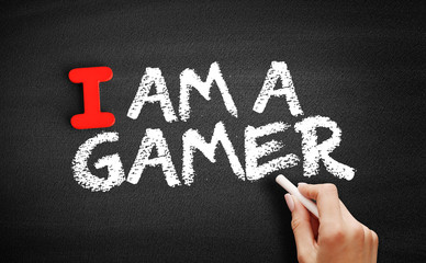 I Am a Gamer text on blackboard, concept background
