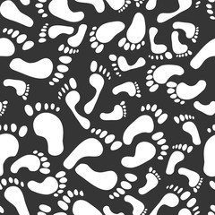 Fototapeta na wymiar Seamless pattern with footprint. Traces of people - men, women, children. Vector