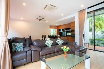 Luxury interior design in living room with open kitchen