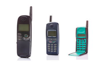 Old retro mobile phones isolated on white background