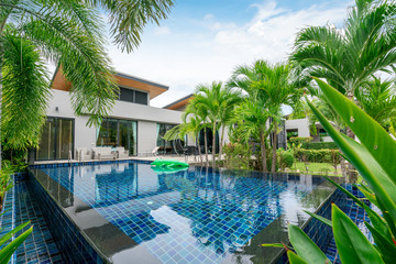 home or house building Exterior and interior design showing tropical pool villa with green garden