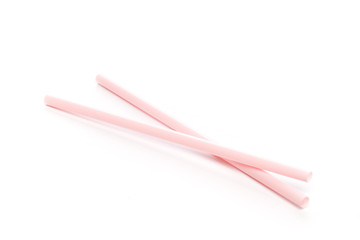 Set of colored straws for drinking cocktails on a white background. Isolated