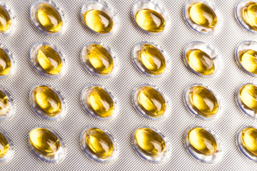Blister pack of fish oil capsules close up view