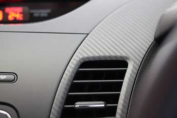 Vehicle dashboard with weave pattern
