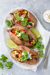 baked sweet potato with vegetables