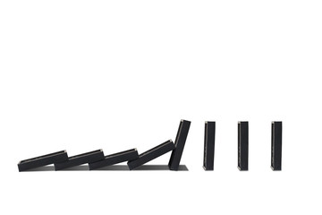 Business Dominoes Effect Concept : Row of dominoes falling isolated on white background.
