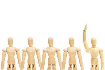 Business Leadership Concept : One in group of wooden figure mannequin rise hand up on white background.
