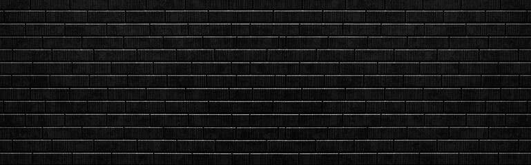Panorama of Black stone block wall texture and background seamless