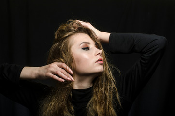 beautiful girl in a t-shirt in the Studio