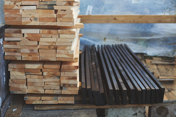 the boards are stacked in the garden