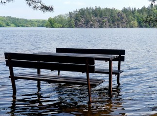 Table and bench in water