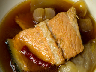 Close up miso soup with salmon.