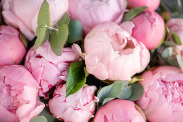 Obraz na płótnie Canvas Close-up of flowers Pink peonies . Beautiful peony flower for catalog or online store. Floral shop concept . Beautiful fresh cut bouquet. Flowers delivery