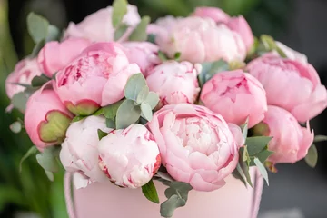 Close-up of flowers Pink peonies . Beautiful peony flower for catalog or online store. Floral shop concept . Beautiful fresh cut bouquet. Flowers delivery