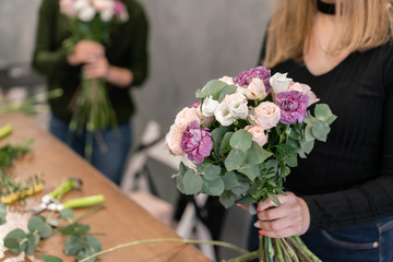 education in the school of floristry. Master class on making bouquets. Summer bouquet. Learning flower arranging, making beautiful bouquets with your own hands. Flowers delivery