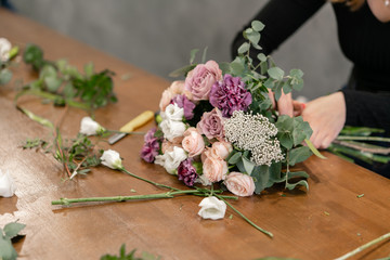 education in the school of floristry. Master class on making bouquets. Summer bouquet. Learning flower arranging, making beautiful bouquets with your own hands. Flowers delivery