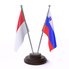 Indonesia and Slovenia, two table flags isolated on white background. 3d image