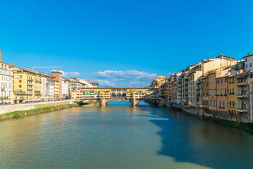 Fototapeta na wymiar Florence, Tuscany / Italy: Ponte Vecchio general view seen from Santa Trinita Bridge