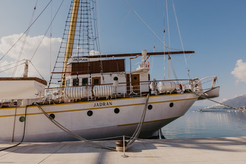 Tivat, Montenegro - 09.11.2018. Cruise ship in sea port, Embankment of Tivat city, Montenegro, in a sunny summer day